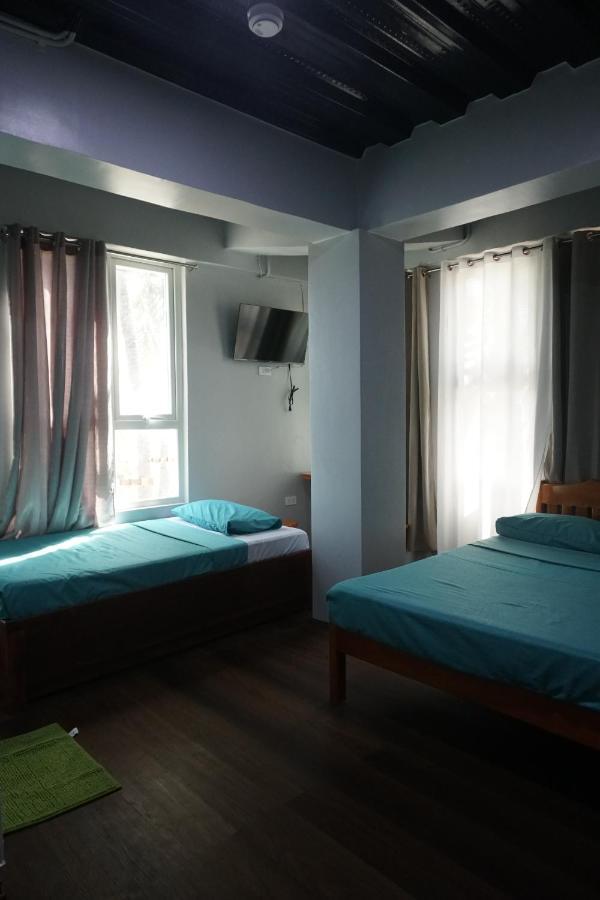 L Cafe Restobar & Lyn'S Guest House Сан Хуан Екстериор снимка